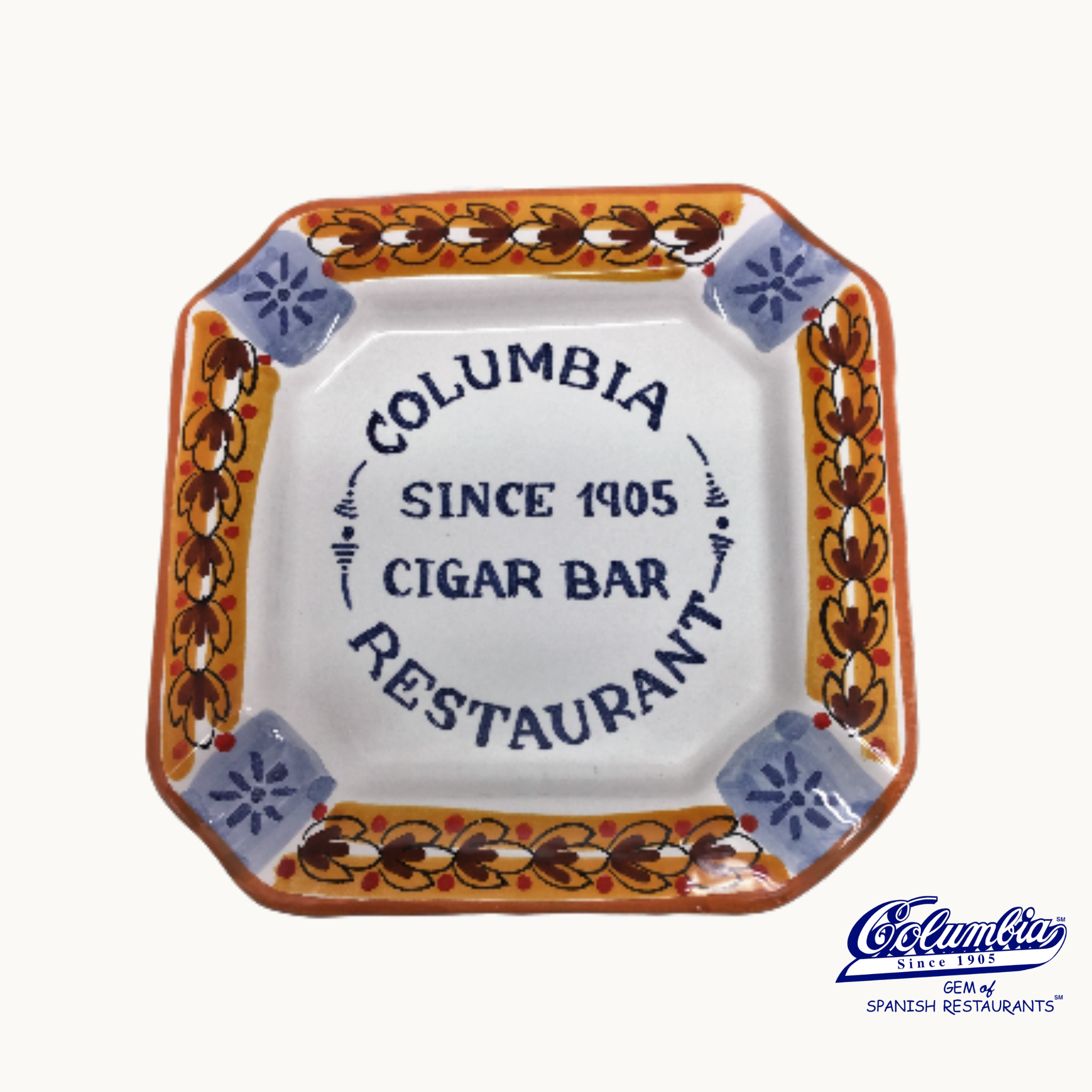 Decorative ceramic ash tray with colorful and text 'Columbia Cigar Bar Restaurant'.