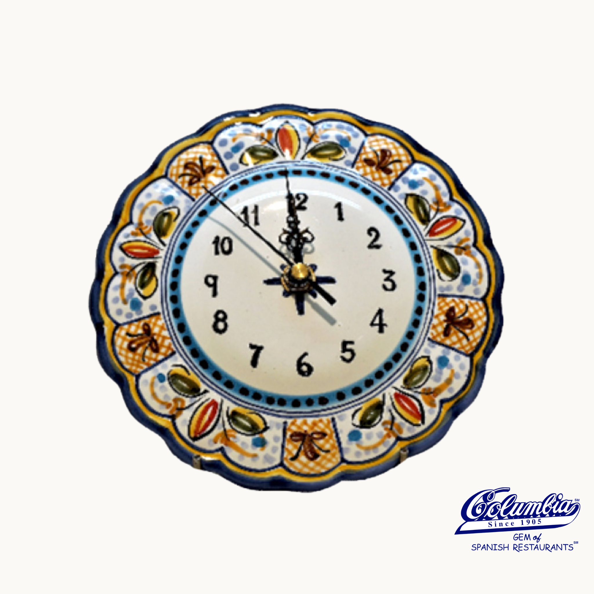Decorative wall clock with colorful floral patterns on a white background.