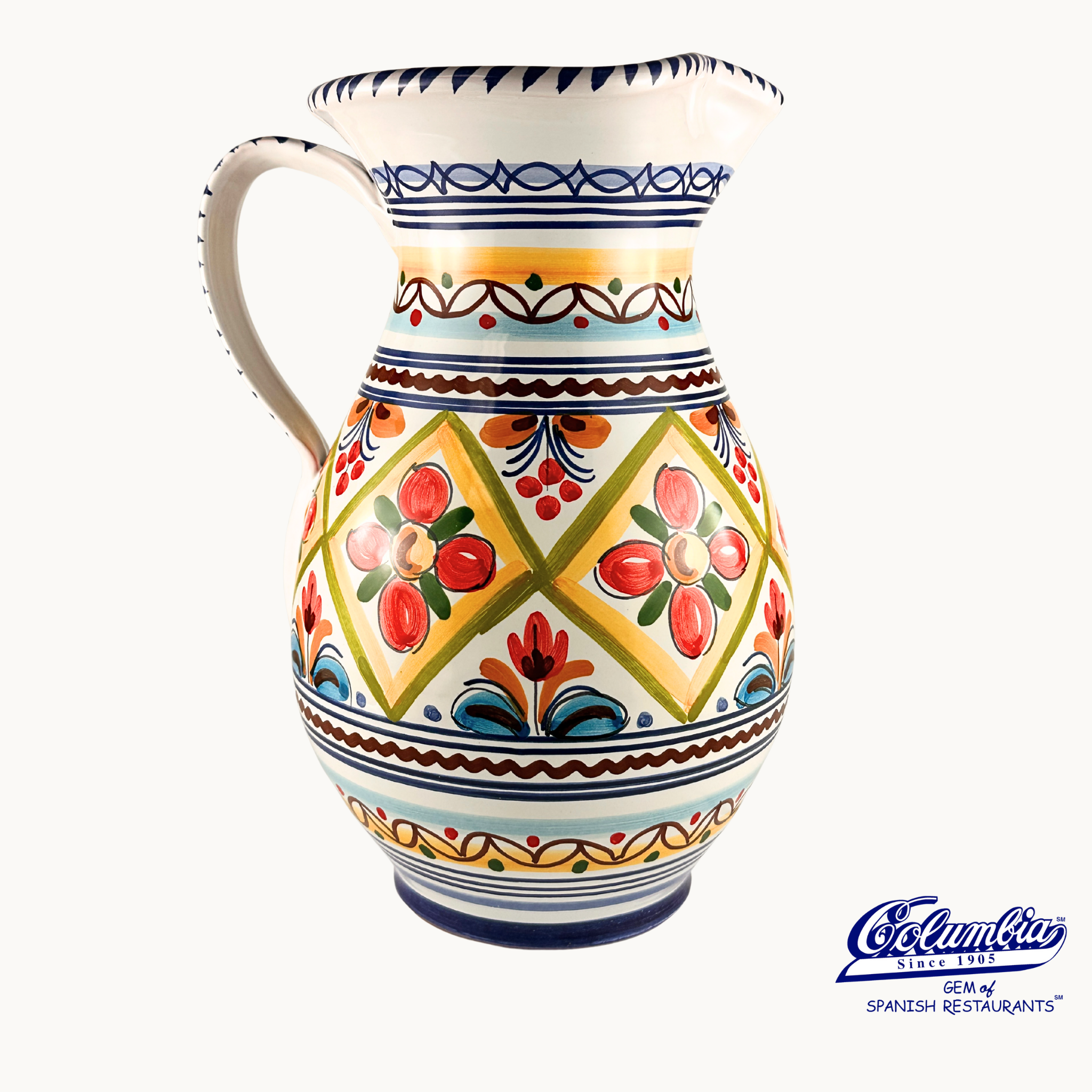 Decorative ceramic pitcher with colorful patterns on a white background
