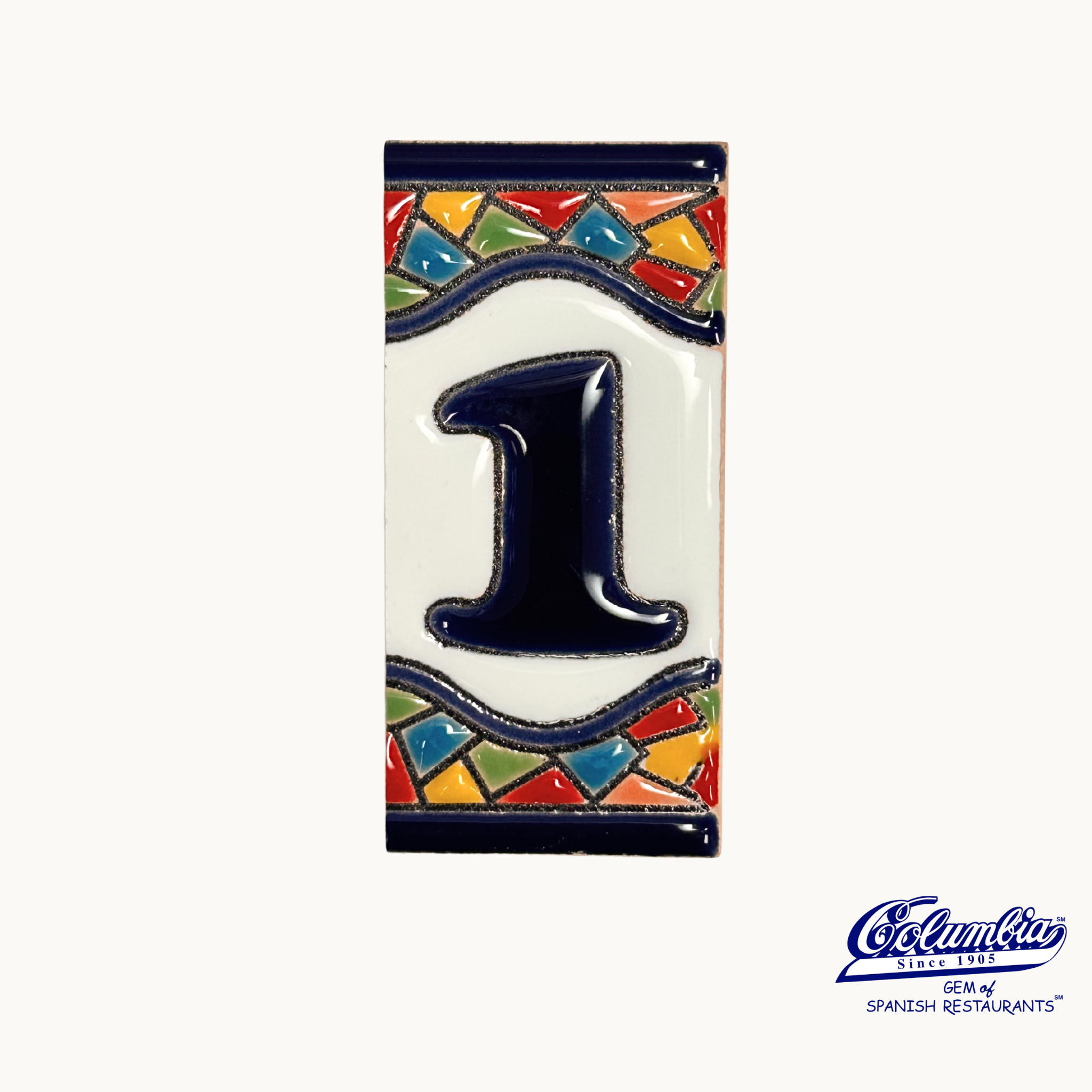 Ceramic tile with the number '1' on a white background, featuring a colorful border.