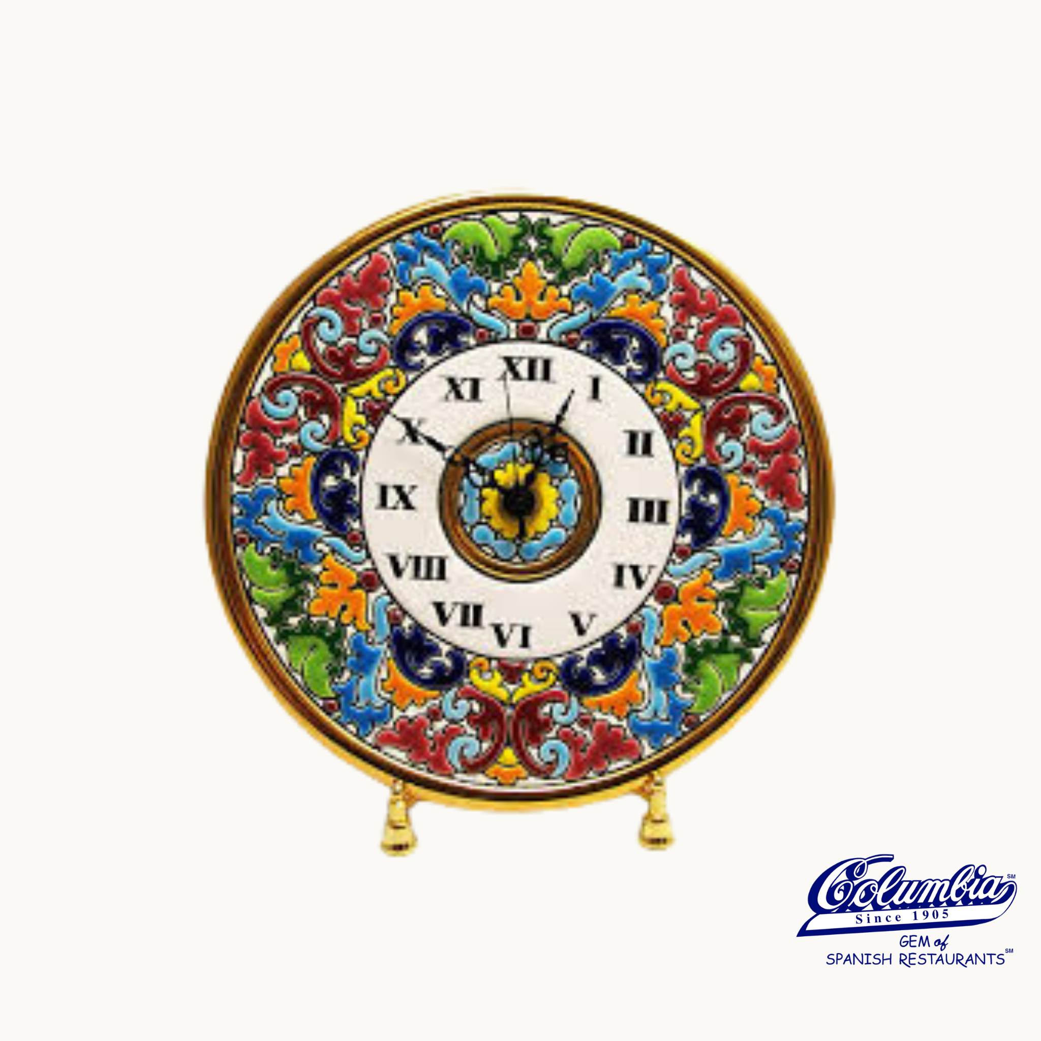 A decorative ceramic clock with a colorful floral pattern and Roman numerals in a gold frame.