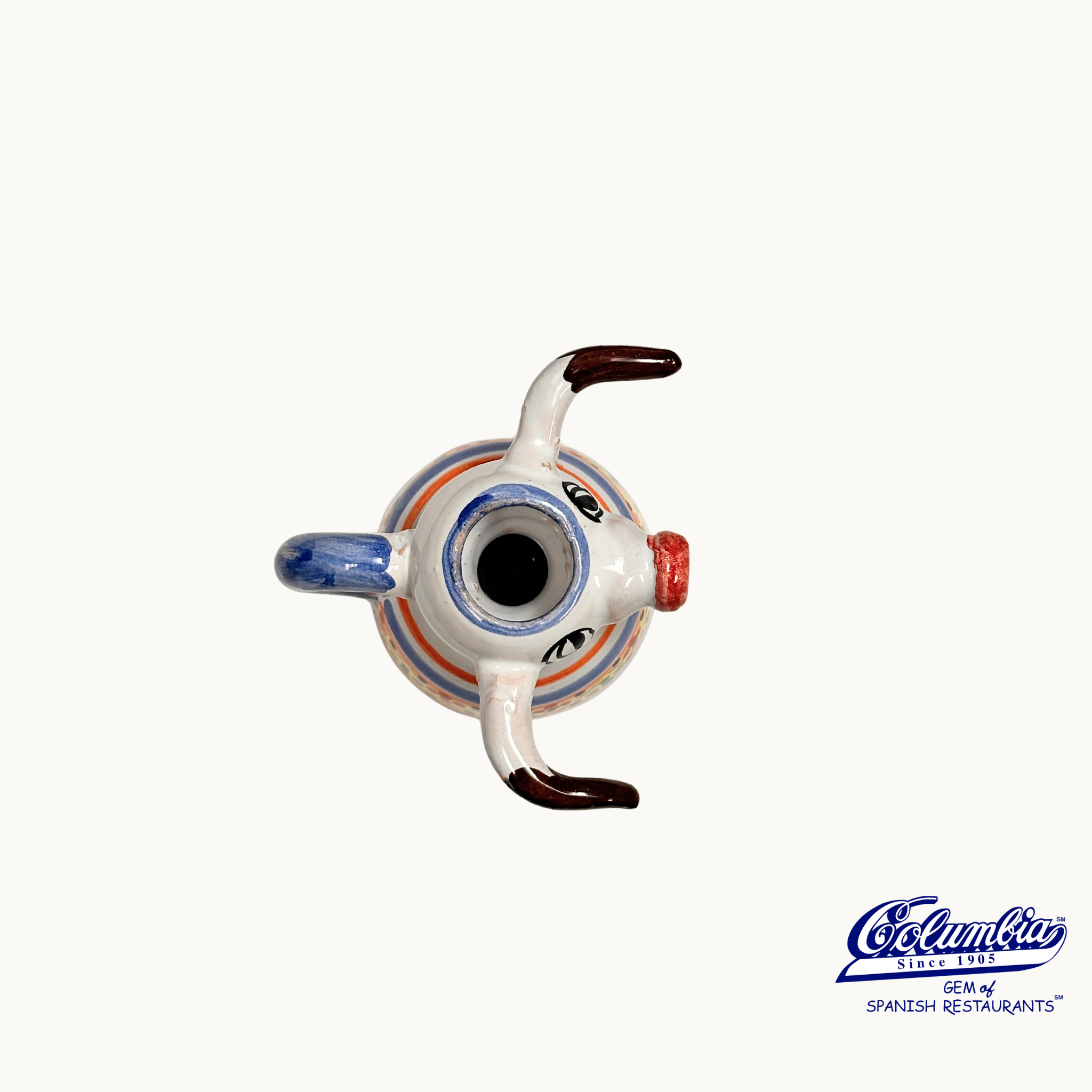 Ceramic teapot with colorful design on a white background, featuring the El Cangrejo logo.