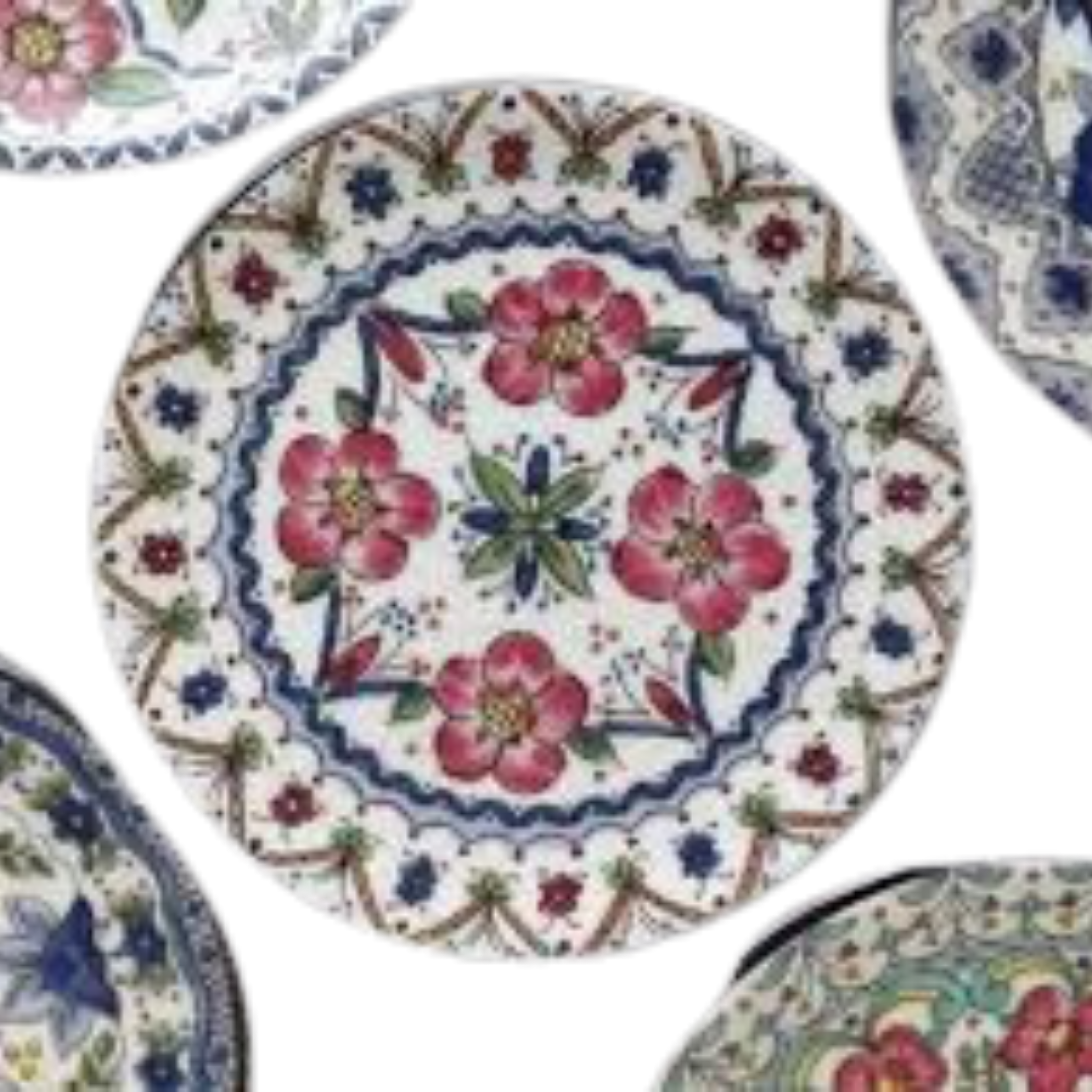A set of ceramic coasters with floral patterns in various colors.