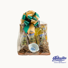 Gift basket with olive oil, herbs, and a bow on a white background.