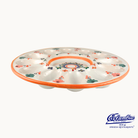 Decorative ceramic egg tray with floral patterns on a white background, featuring the Coquimbo brand.