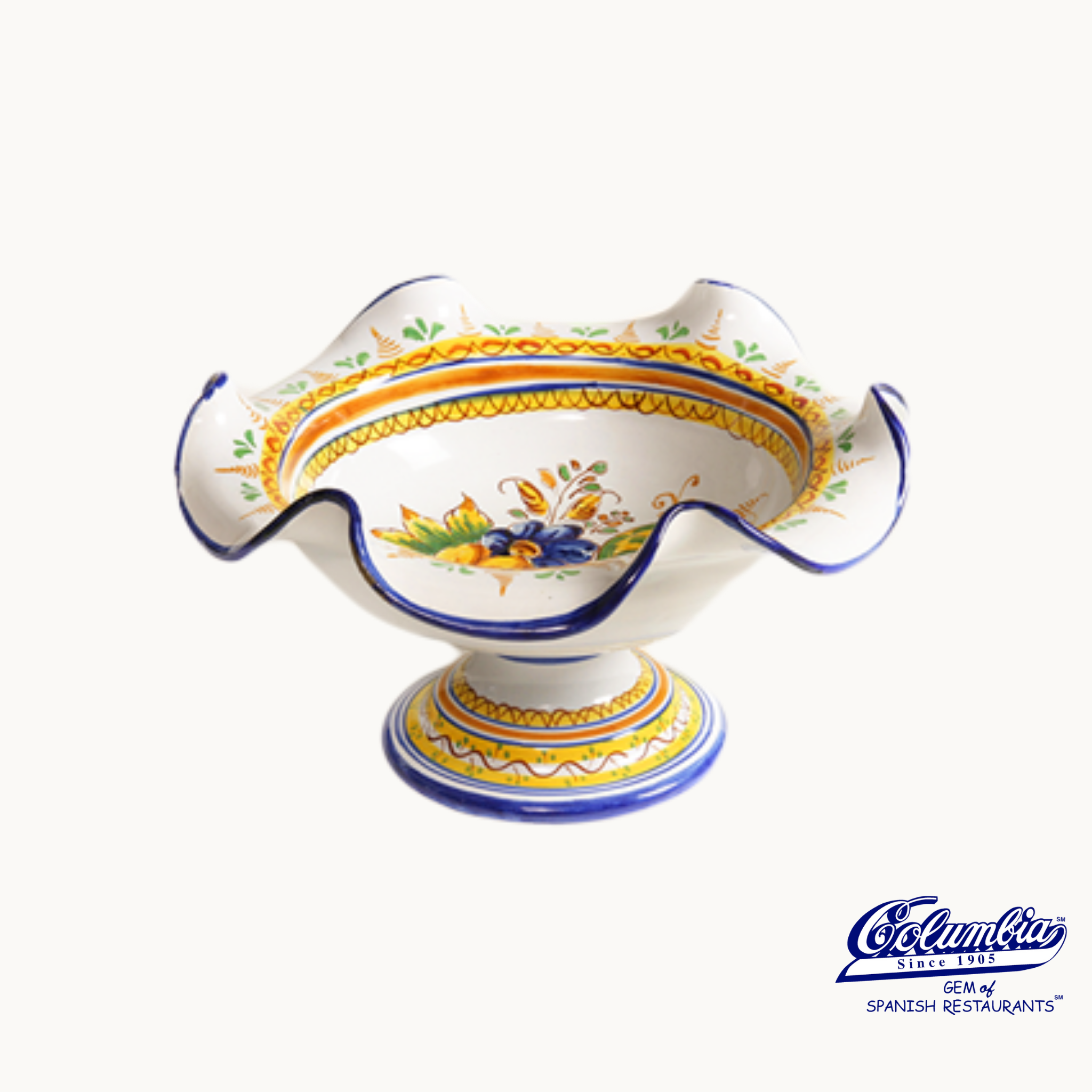 Decorative ceramic bowl with colorful patterns on a white background