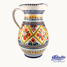 Decorative ceramic pitcher with colorful patterns on a white background