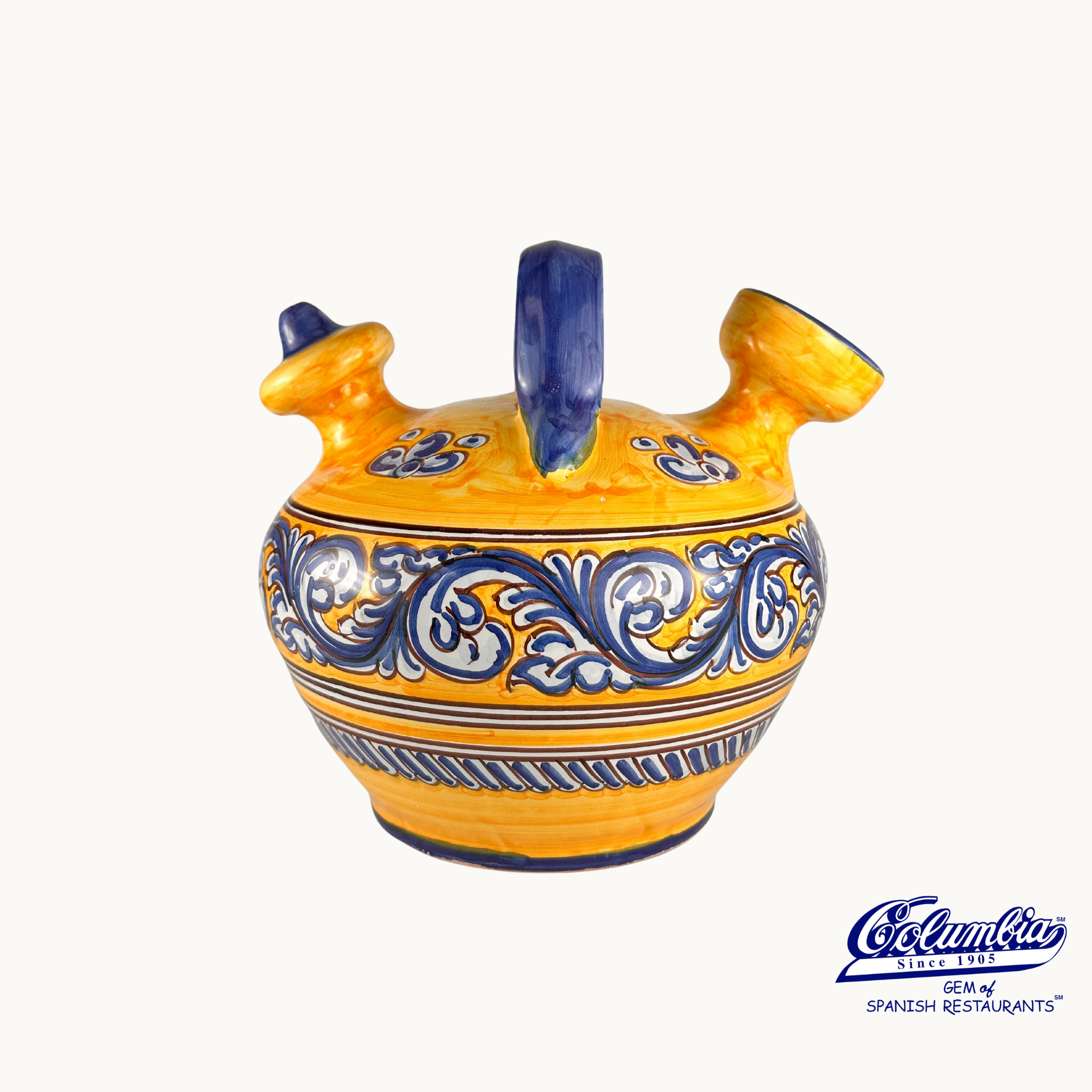 Decorative ceramic jar with blue and white patterns on a white background, featuring the Columba brand.