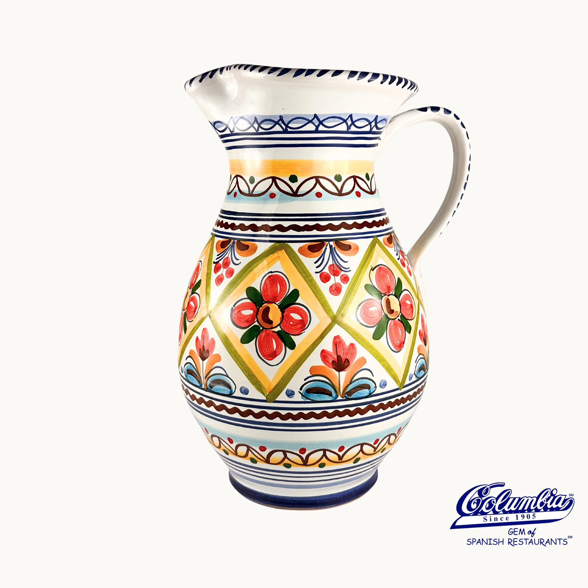 Decorative ceramic pitcher with colorful patterns on a white background