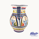 Colorful ceramic pitcher with decorative patterns on a white background, featuring the Columbus brand.