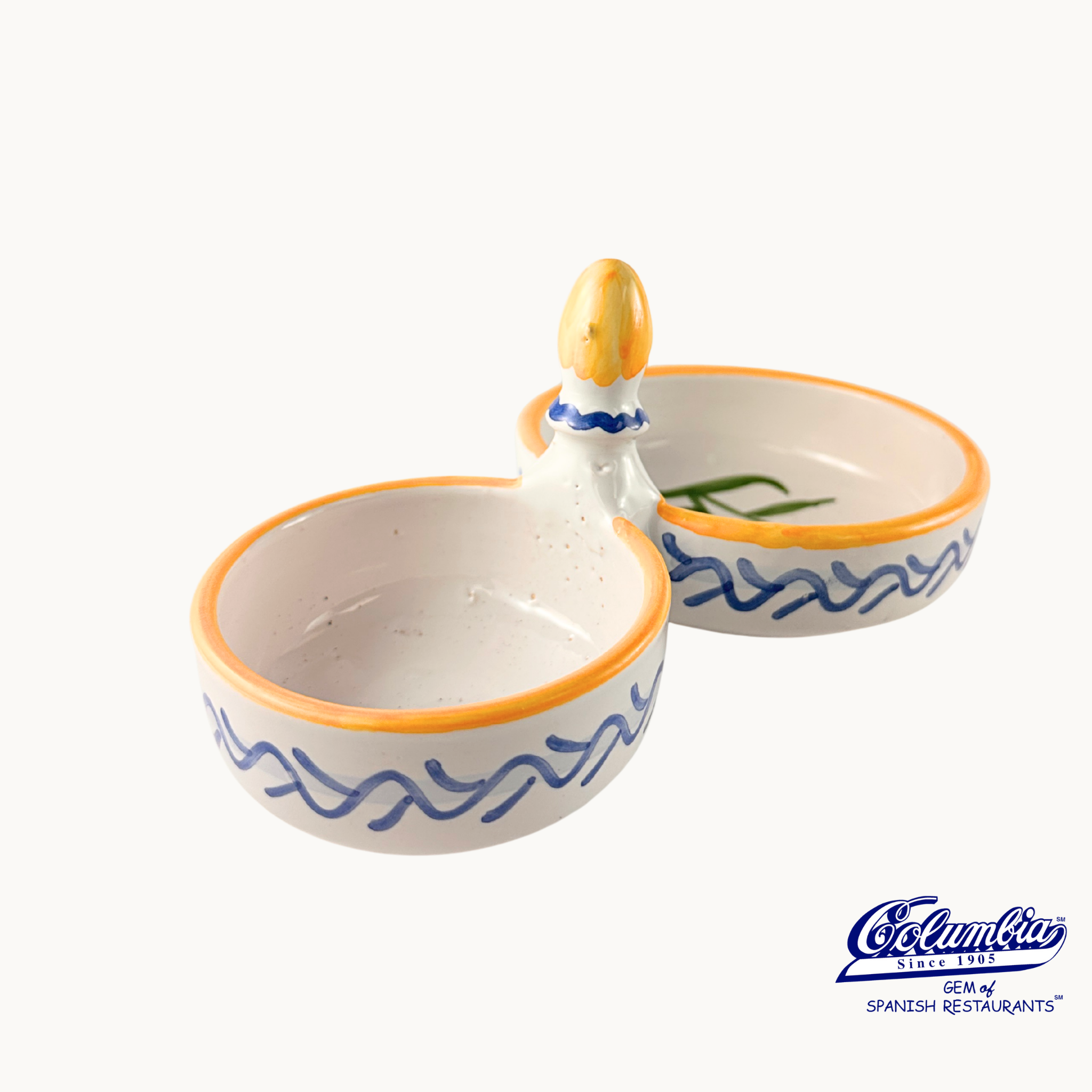 Ceramic salt and pepper shakers with a duck design on a white background, featuring the El Cangrejo logo.