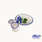Ceramic set with cups and a bowl featuring blue and green designs on a white background.