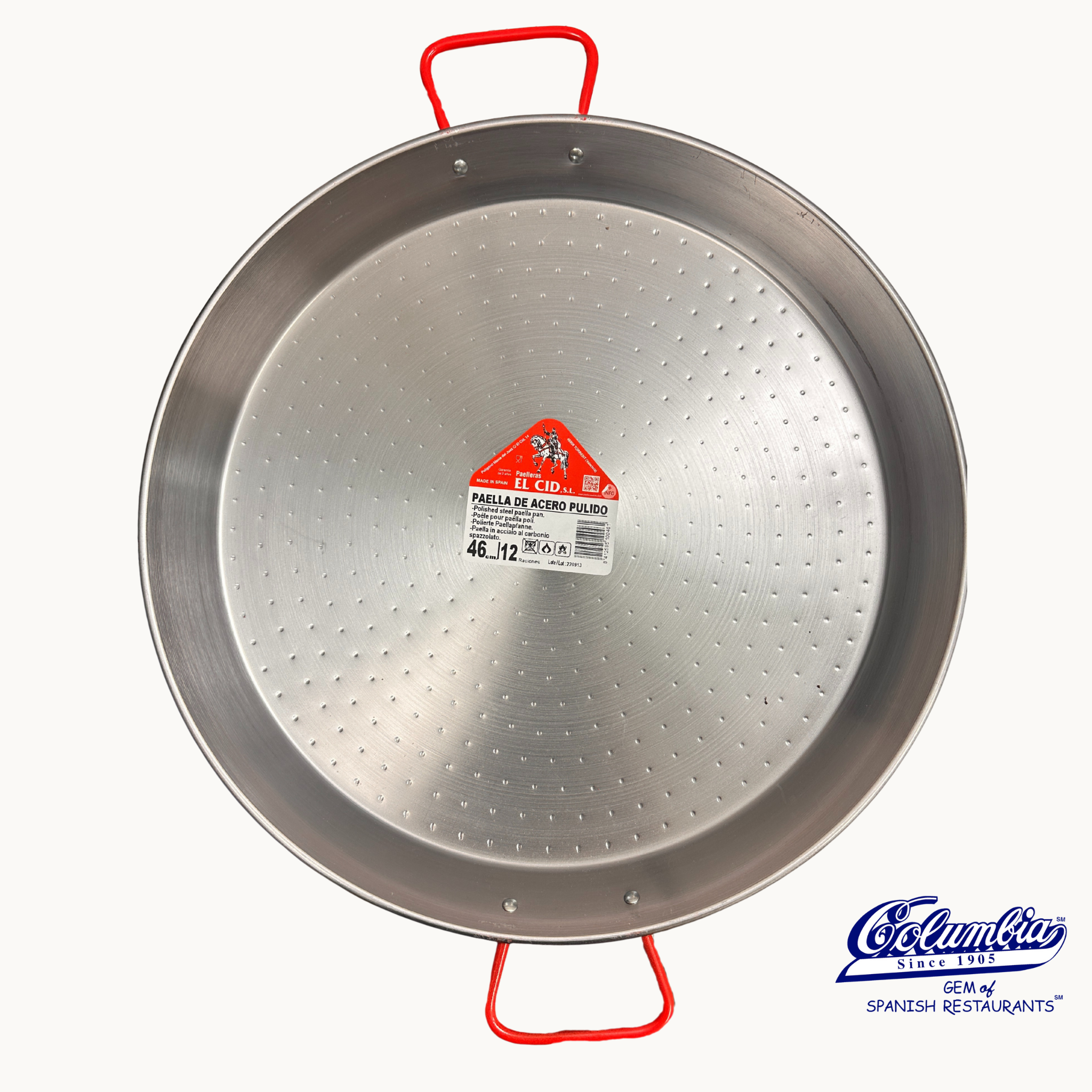 Large metal paella pan with red handles on a white background, featuring a brand logo.