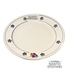 A white ceramic 12-inch dinner plate with blue floral patterns and the text 'CASA SANTO STEFANO'.