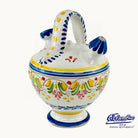 Decorative ceramic jar with colorful patterns on a white background, featuring the Columba brand.