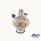 Decorative ceramic jar with colorful patterns on a white background, featuring the Columba brand.