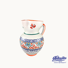 Decorative ceramic pitcher with colorful patterns on a white background, featuring the Columbia  logo.